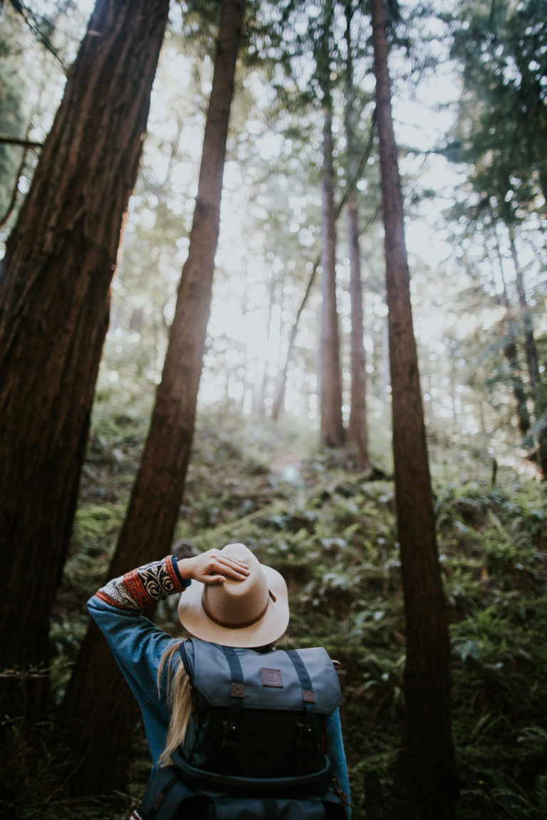 Woman Hiking in forest in California