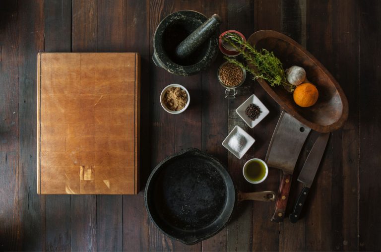 cutting board, spices, and a cleaver